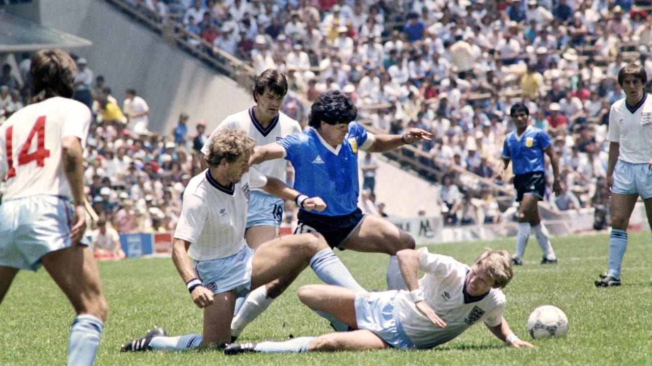 Thirty years ago on June 22, 1986 Maradona scored two goals against England, the first one dubbed Hand of God goal with his left hand as he jumped for the ball in front of goalkeeper Peter Shilton. / AFP PHOTO / -