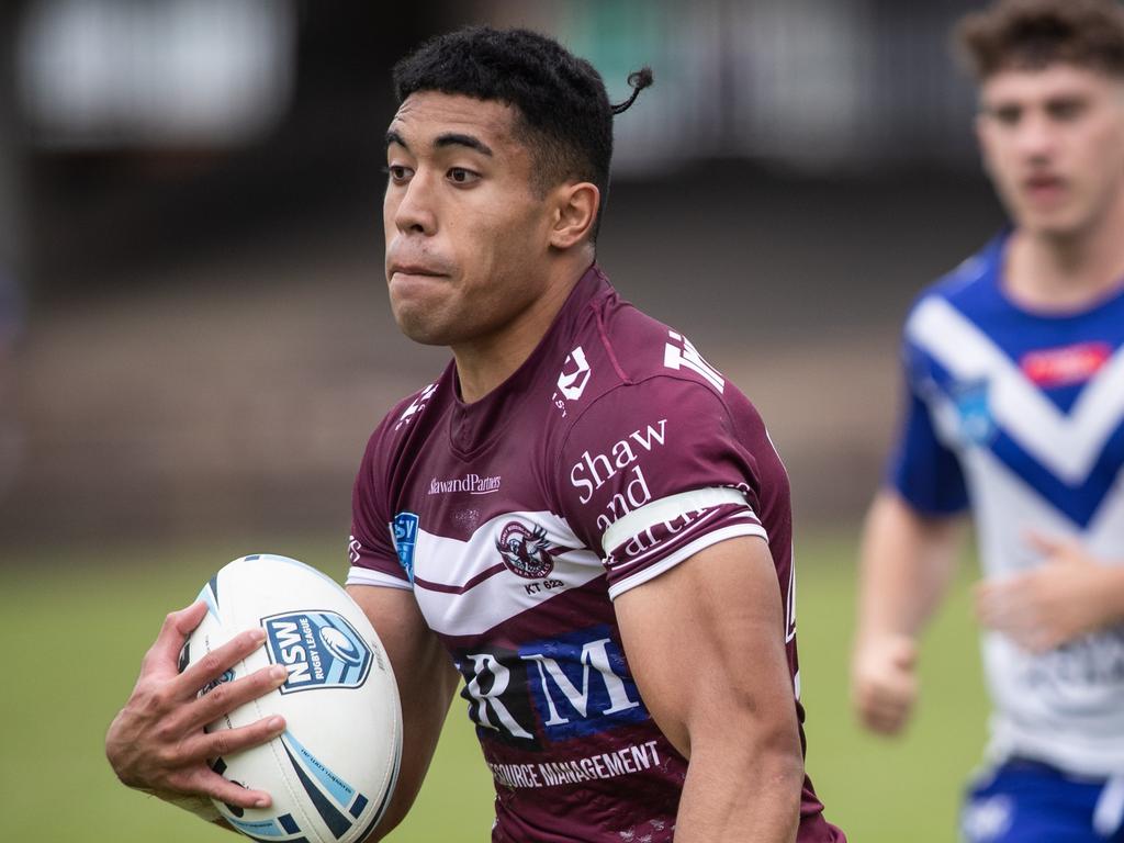 Manly's Tolutau Koula storms to the try line. Picture: Julian Andrews.