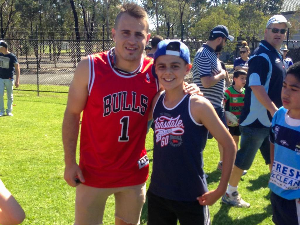 A young Kiraz with one of his Bulldogs heroes Josh Reynolds. Picture: Supplied