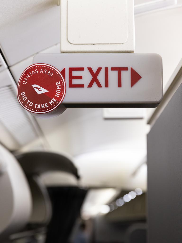 This included exit signs, bathroom vanity and mirror, and premium economy seats.