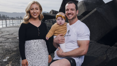 Mullen with partner Tam Chessell and six-month-old daughter Stevie.