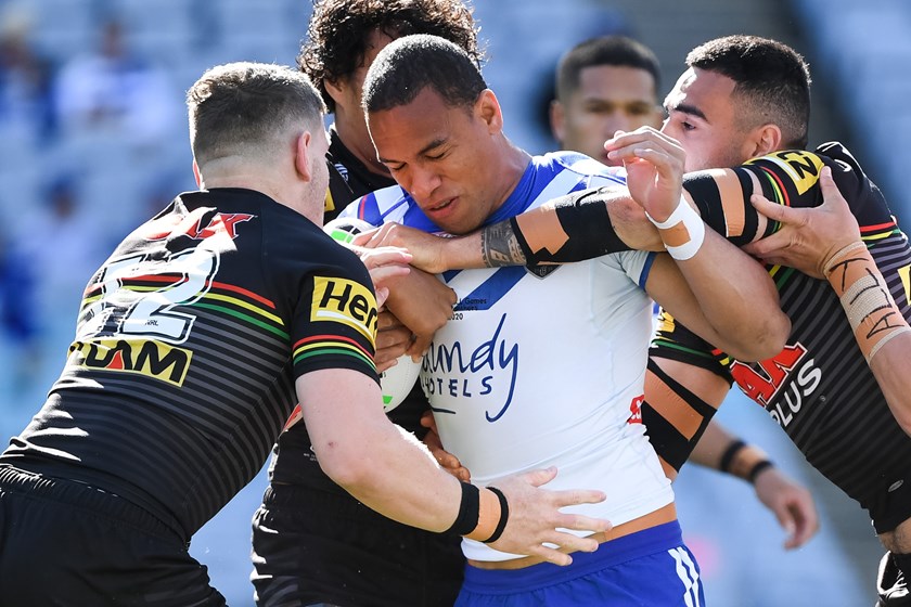 Will Hopoate is rounded up by the Panthers.