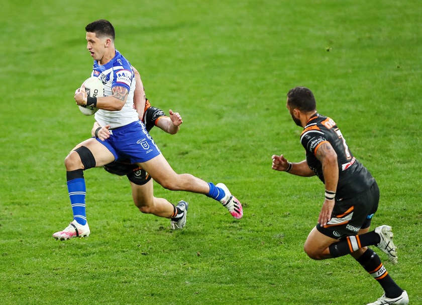 Jeremy Marshall-King strides away from his older half-brother, Benji Marshall.